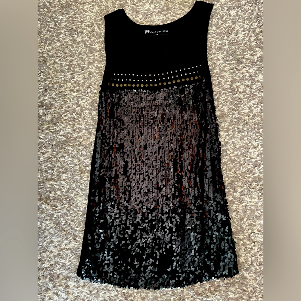 In great preloved condition (barely worn) Beautiful eye catching top